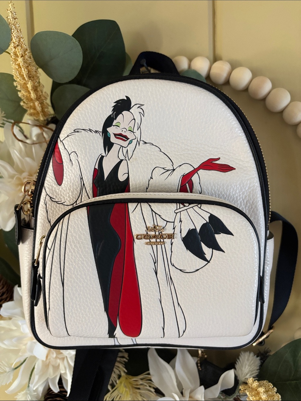 Coach x Disney Cruella Motif Mini Court Backpack